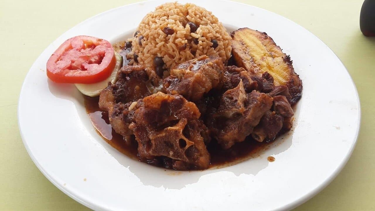 Oxtail with rice and peas. Preapred and served with love!